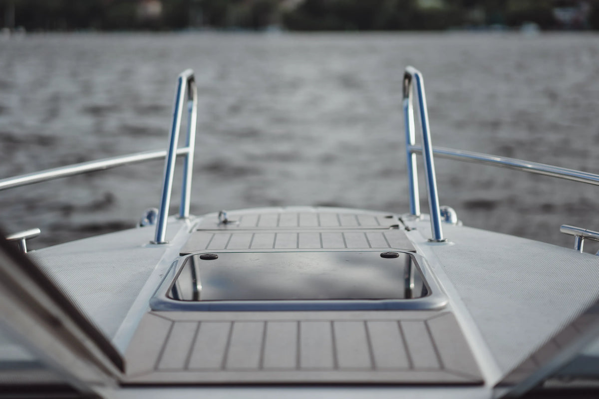 Details of the yacht, deck, reflection of the sky.