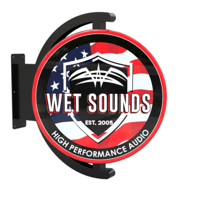 Close-up of Wet Sounds logo on rotating pub sign showing durable construction and illuminated detailing for home bar or garage setup